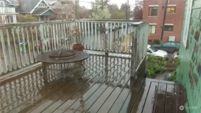 Another view of the deck beside Apartment 1, taken on a rainy day.