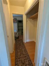 The bathroom is on the left, and a closet on the right as you enter the bedroom.