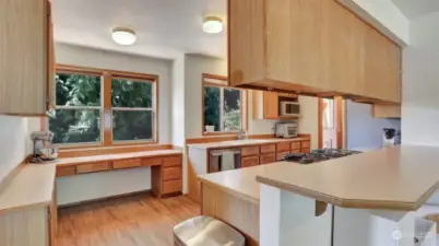 Stepping into this massive kitchen you will find ample cabinet and counter space.