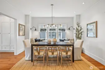 Cozy dining room features built-in bench with storage drawers