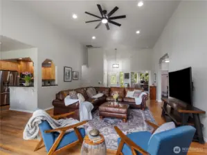 Large living room opens to the kitchen and eat-in dining space. The home was just freshly painted a soft neutral color.