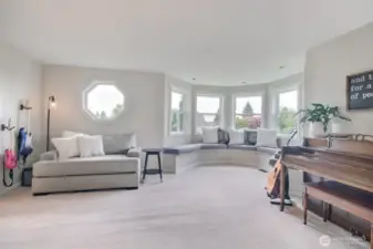Step into a spacious and light-filled living room designed for comfort and creativity.