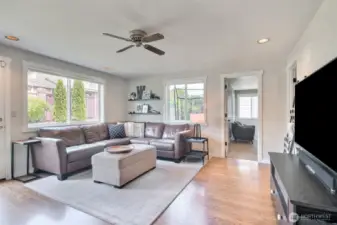 family room with recessed lighting and ceiling fan.