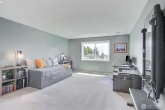 4th oversized bedroom upstairs with custom walk in closet.
