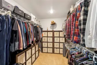 Into the massive primary closet with attic access.