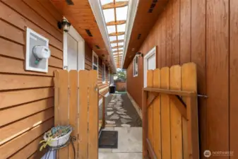 Covered area to the garage is thoughtful in the winter months.