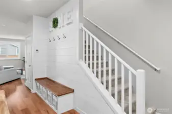 Warm and welcoming entry with built-in bench with storage.