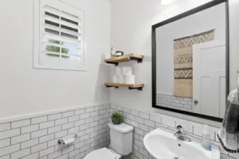 First floor tiled powder room.