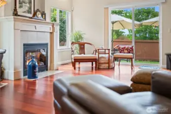 The hardwoods extend throughout the 1st floor to create a warm sensation, accompanied by the gas fireplace in the living room.