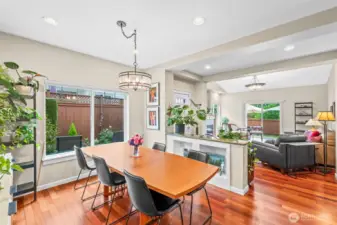 Main floor has soaring 9-foot ceiling and an abundance of light filling the living areas through the large double-pain windows.