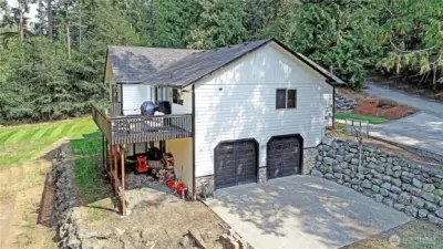 Big driveway w/lots of parking, yard, surrounded by serene greenbelt.