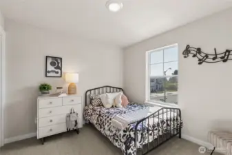 Two of three upstairs bedrooms, this one has a walk in closet!