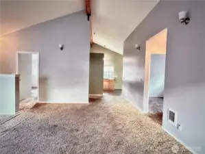 Open living room with vaulted ceiling