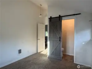 Bedroom one with half bath