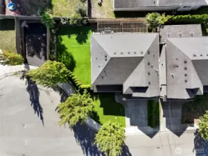 Oversized lot with sports court or fenced RV parking.
