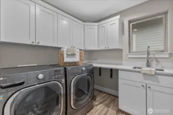 UTILITY ROOM CONVENIENTLY LOCATED UPSTAIRS NEAR BEDROOMS