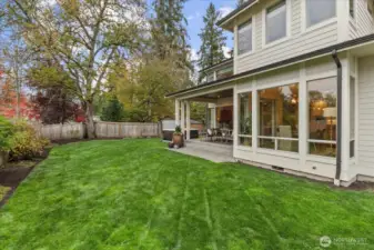 SPACIOUS, PRIVATE, FULLY-FENCED YARD