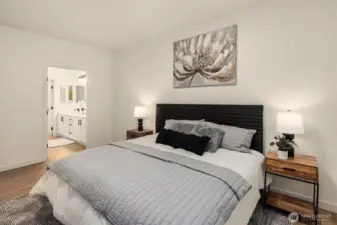 Primary suite has it's own private 3/4 bath with large walk in shower and walk in closet. Dual vanities for ultimate convenience.