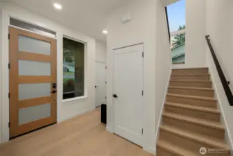 Step inside to the main level with souring 10-foot ceilings and wide-plank hardwood floors.