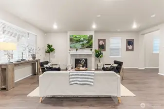 Light, bright and airy, this great room allows for comfortable entertaining.