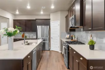 At almost 15 feet long, there is counterspace for every one of the Chefs helpers to work at!