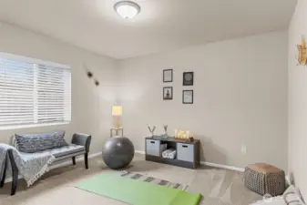 Bedroom # 4 staged as an exercise room.