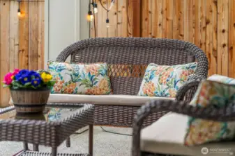 The covered patio offers a relaxing spot.