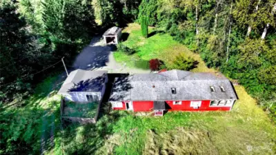 Bird's eye view from the back of the property looking towards the homes, front yard and private entry gate.