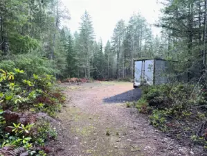 Entering your property 1st RV site is on the left. To the right is your storage trailer with plenty of room to store your toys.