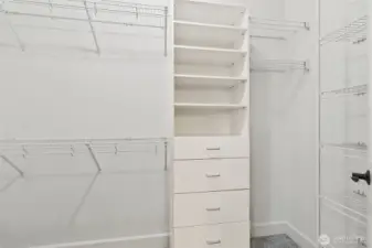 Primary walk-in closet.