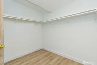 Primary closet virtually staged