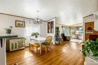 Dining room and separate family room in back by two bedrooms.