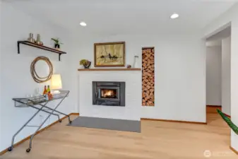 Second fire place insert has high end tile and old cedar mantel that came out of the puget sound!
