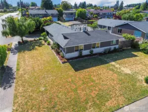 Double corner lot that gets tons of sun! Could have huge gardens here!