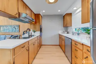 MId-century kitchen with meautiful wood cabinets and brand new appliances.