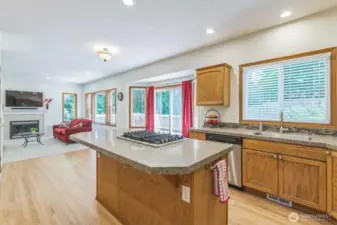 Eat-in kitchen at the nice sized island, or there is room before the slider for a kitchen table.