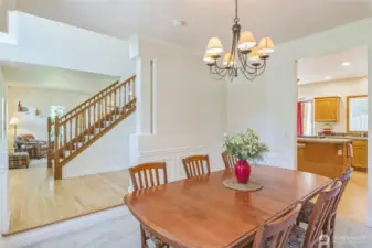 Enter the home and notice the newly refinished oak floors.  Beautiful dining room to the right.