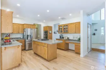 Unique granite counters and sturdy oak cabinets make a beautiful and functional kitchen.