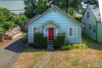 1 story gem in the heart of Olympia's Westside. Note the garden beds to the left of the home.