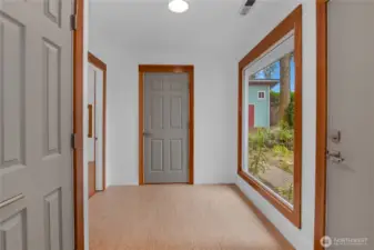 View from kitchen. Door to the right leads to back yard and door straight in front leads to the 3/4 bath/laundry room.