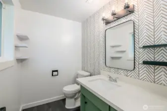 Beautifully remodeled 1/2 bathroom off of primary bedroom.