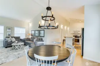 Vaulted ceiling add space to this cottage as well as the large deck off this space.