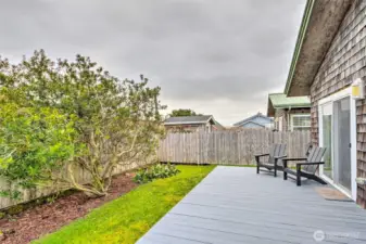 The south facing back deck is perfect for entertaining off the living space.