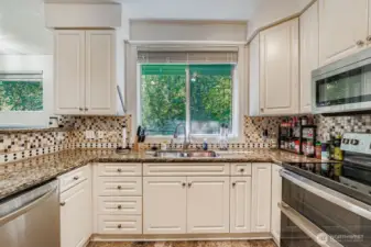 Stainless steel appliances shine in the updated kitchen.