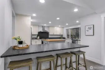 Large island for additional eating space, entertaining or work station!