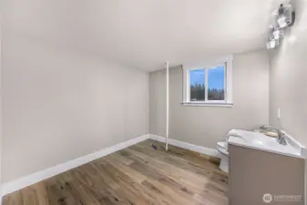 Installed as a 1/2 bath but ready to be converted into full if you desire, there are drains in the floor ready for a tub or shower, you could even add second laundry