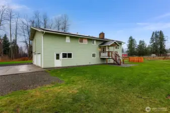 Two car garage with plenty of additional parking on site, garage has additional access door to the main yard