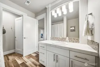 Guest bathroom. Beautiful tile flooring.