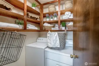 Laundry room with tons of storage.