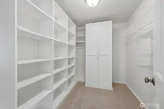Walk-in closet off primary bedroom